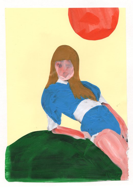 a couple of women sitting on top of a bed