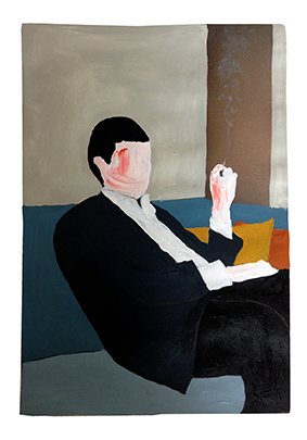 a couple of men sitting on a couch