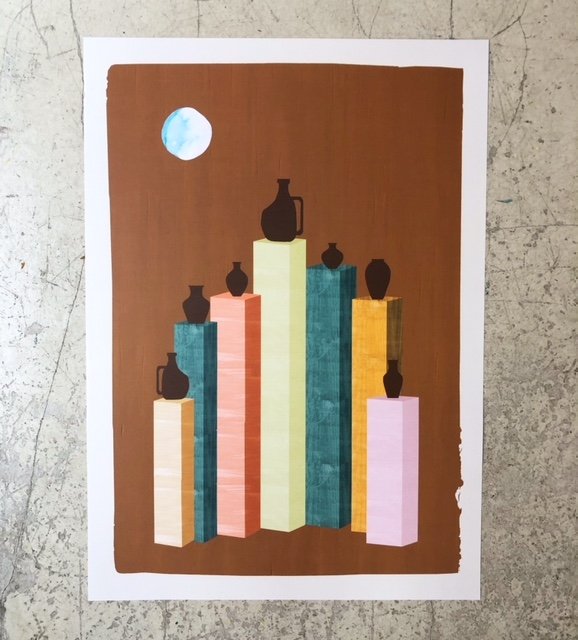 a book shelf filled with books and a laptop