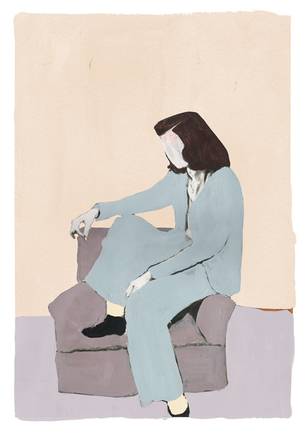 a statue of a man sitting on a skateboard