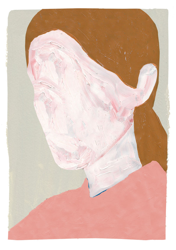 a pink teddy bear sitting on a piece of paper