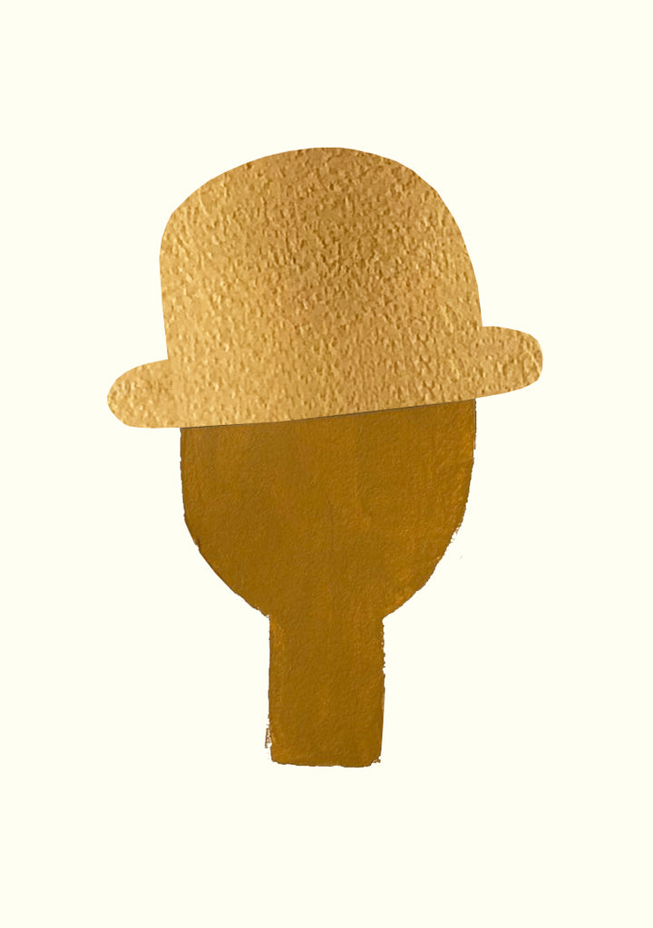 a yellow hat sitting on top of a yellow hat